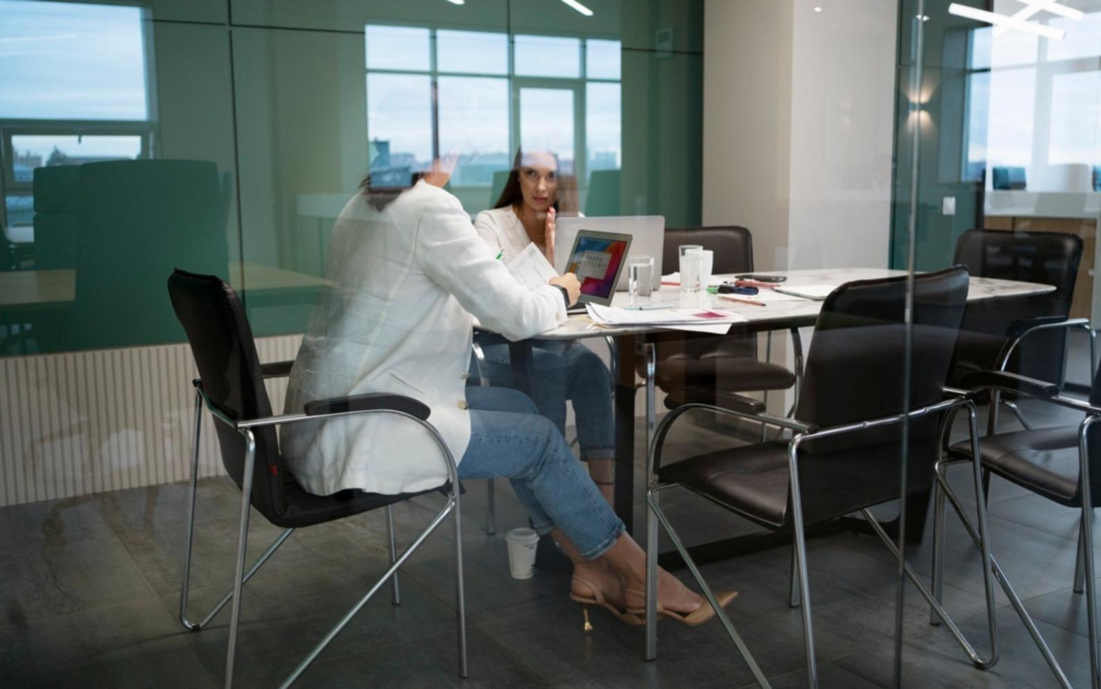 Professional training environment with participants engaged in business formation workshop